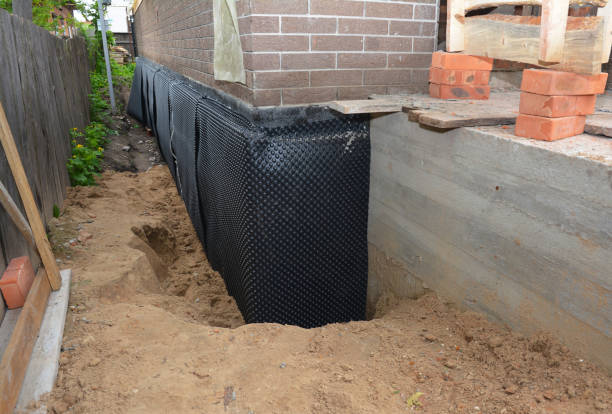 Happy homeowners after waterproofing job in Sykesville